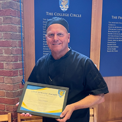 Gary Dougan with his 40yrs service award